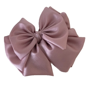 Elegant multi-layered rose pink satin bow hair claw clip for a sophisticated ponytail