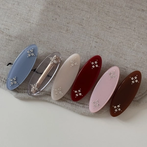 French vintage oval hair clips with sparkling rhinestone flower motifs in six colors