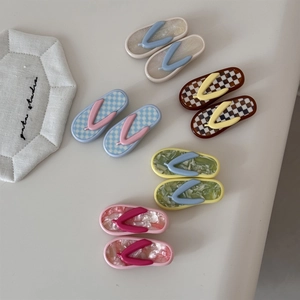 Detailansicht der Acetat-Haarspangen in Flip-Flop-Form mit verschiedenen Mustern