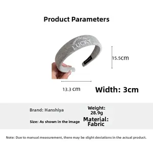 Detailed size and weight dimensions of a grey LUCKY embroidered fabric headband