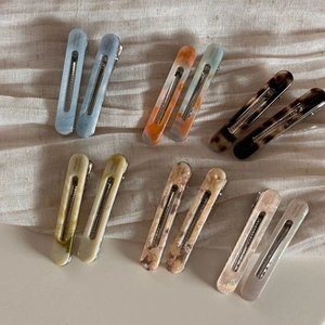 Set of 12 hollow acetate hair clips in various marble patterns with France Handmade text