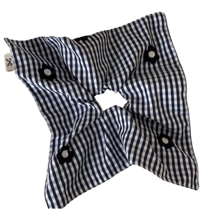 Checkered blue gingham scrunchie with 3D floral accents and a small bow tag
