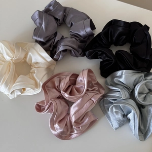 Five-piece set of elegant satin silk scrunchies in gray black cream and pink tones