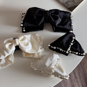 Elegant satin bow hair claws and clips set with pearl trim in black and ivory white