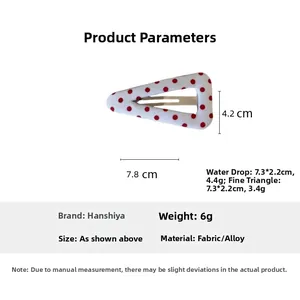 Detailed dimensions of red polka dot fabric hair clips in teardrop and triangle shapes