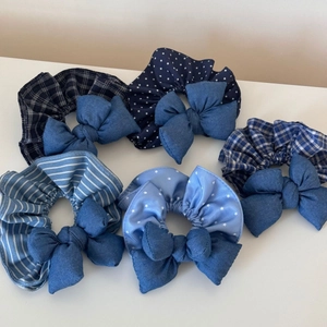 Set of five blue denim bow scrunchies featuring plaid, polka dot and star patterns