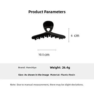 Detail view of glossy black hair claw clip showing precise 10.5cm length measurements