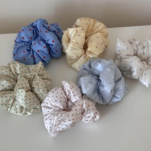 Set of six satin silk scrunchies with polka dot and heart patterns in assorted colors