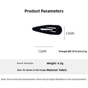 Size guide for navy blue polka dot hair clip showing 7.5cm length and fabric texture