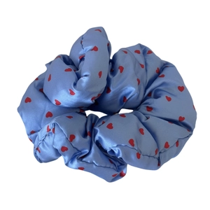 Light blue satin hair scrunchie with red heart pattern for comfortable hair styling