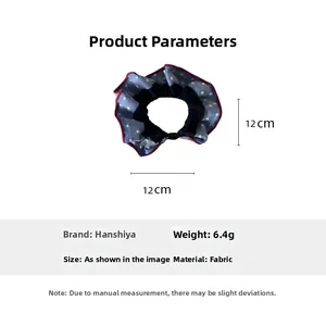 Detailed specs of 12cm blue polka dot fabric scrunchie with size and weight info