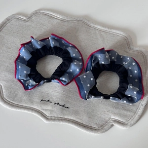 Denim polka dot scrunchie set with red ruffled edges for versatile ponytail styling