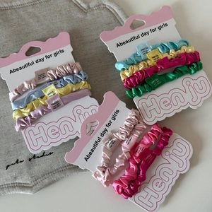 Set di 4 elastici in raso colorati ad alta elasticità per eleganti acconciature a coda di cavallo