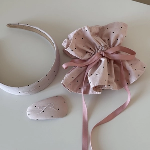 Detailed set of pink polka dot hair accessories with bow embroidery and headband