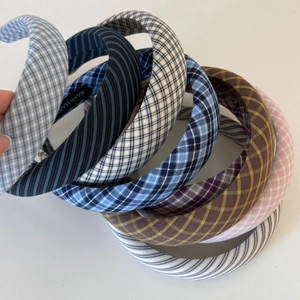 Set of padded headbands featuring retro British plaid patterns and handmade label