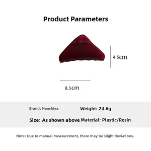 Detail showing the 8.5cm x 4.5cm dimensions of this transparent red resin hair claw clip