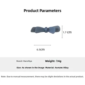 Detailed product size chart for acetate bow hair clip showing 6.5cm length and materials