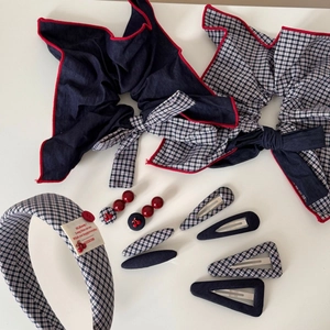Retro navy plaid bow hair accessories set with cherry decorations and BB clips on white base