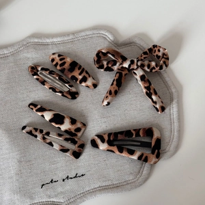 Elegant leopard print hair clip set with brown animal pattern for women hairstyle