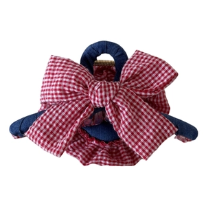 Denim and red gingham bow hair claw clip with a stylish cross-pattern fabric design