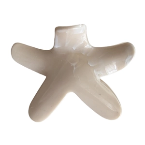 Chic cream-white starfish hair claw clip with a glossy finish for elegant hair styling