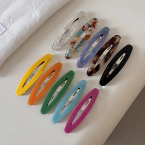 Set of 10 vintage French oval acetate hair clips in various colors and patterns