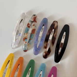 French vintage oval acetate hair clips in multiple colors with Barrette La France text