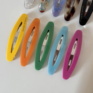 French vintage oval acetate hair clips in multiple bright colors with cutout design