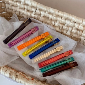 Set of 9 colorful acetate hair clips with gold metal base and handmade engraving