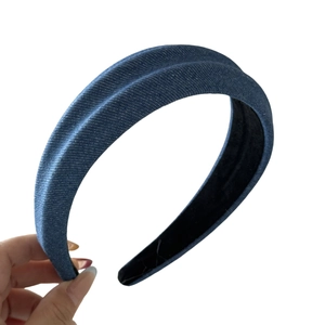 Padded denim headband with ridge design for high cranial top hairstyle in blue