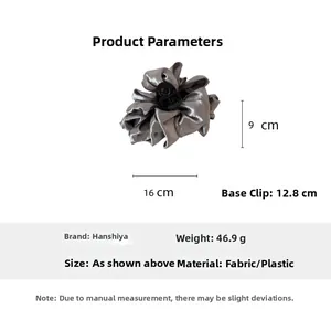 Detail showing oversized silver gray satin ruffled hair claw clip dimensions 16cm x 9cm