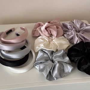 Glossy satin headband and oversized scrunchie set with shimmering fabric for hair styling