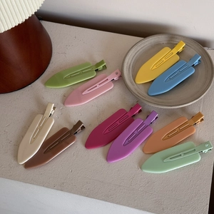 Matte candy-colored seamless hair clips in ten diverse shades for daily styling