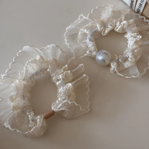 Elegant cream white organza scrunchies with iridescent pearl detail and pleated embroidery