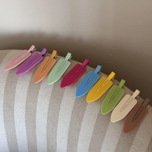 Set of 10 colorful matte seamless hair clips for makeup and styling in vibrant candy tones