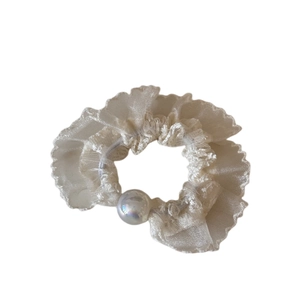 Elegant cream organza hair scrunchie with lace trim and iridescent pearl bead detail