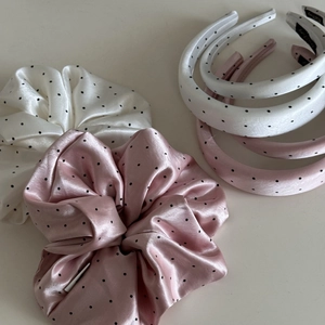 Sweet pink and white polka dot satin headband and scrunchie set for elegant hair styling