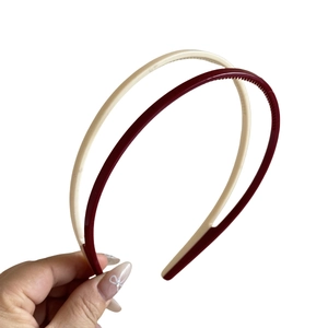 Candy-colored non-slip headbands set with inner teeth for secure hair styling