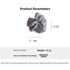 Detail view of a 17cm oversized light purple satin scrunchie with dimensions and weight