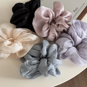Five assorted soft-colored satin oversized scrunchies set in elegant French style