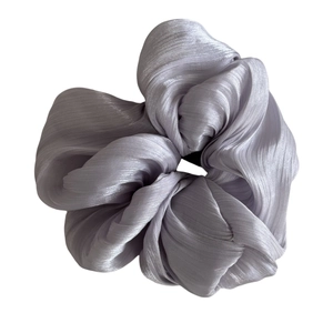 Lustrous light purple pleated satin scrunchie with a metallic silk finish for bun hair