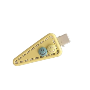 Triangle yellow hair clip with cute smiley face patterns and fine stitching detail