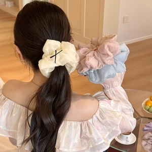 Chic oversized organza bow scrunchies in cream white, light pink, and misty blue colors