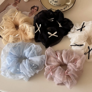 Set of five elegant mesh bow hair scrunchies in champagne, black, white, blue, and pink