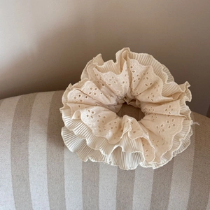 Elegant cream-white oversized lace scrunchie with four layers of floral eyelet embroidery