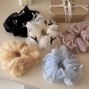 Detailed set of five mesh tulle hair scrunchies with sweet bows in assorted pastel colors