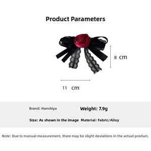 Detail shot of gothic red rose hair clip with black lace tassels and 11cm size measurements