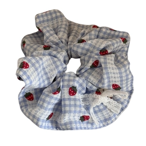 Blue plaid scrunchie with strawberry print and lace bow for women's hair styling
