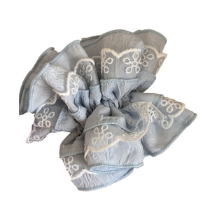 Light blue floral lace scrunchie with layered ruffle design for elegant hair styling