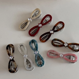 Set of 8 elegant acetate bow hair clips in assorted colors with square rhinestones